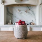 Layered chia seed pudding with fresh fruits and honey.